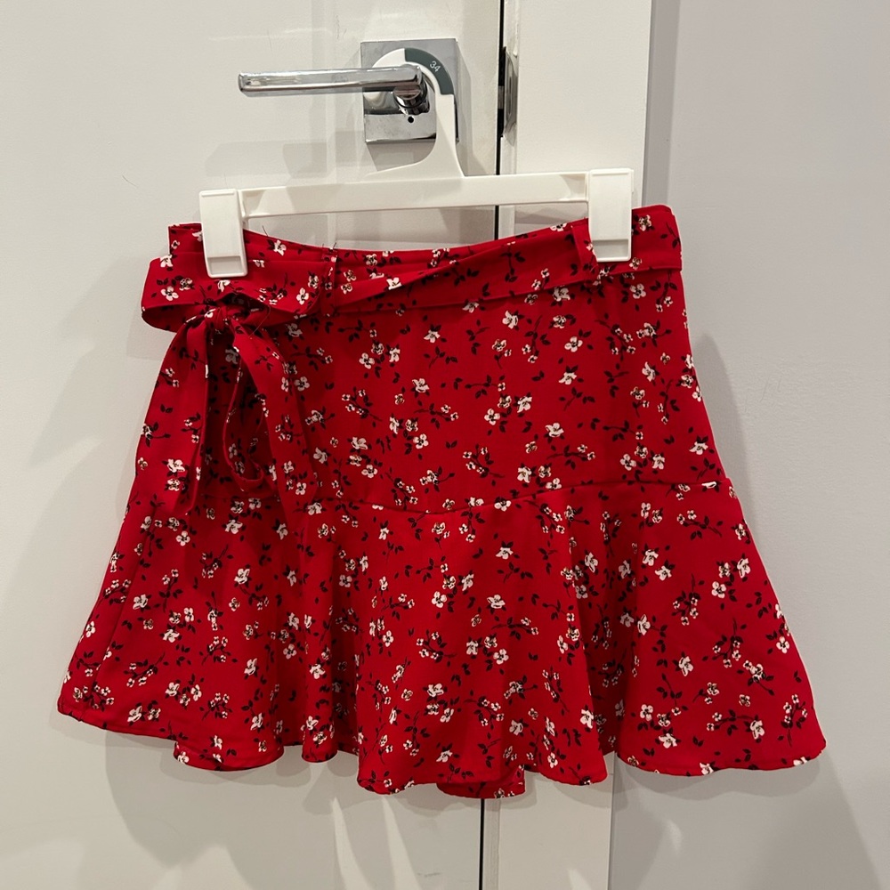 Red skirt and shorts under